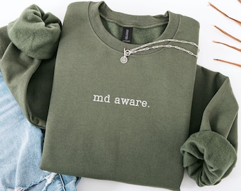 MD Aware. – Embroidered Doctor Sweatshirt (Hospital Humor)