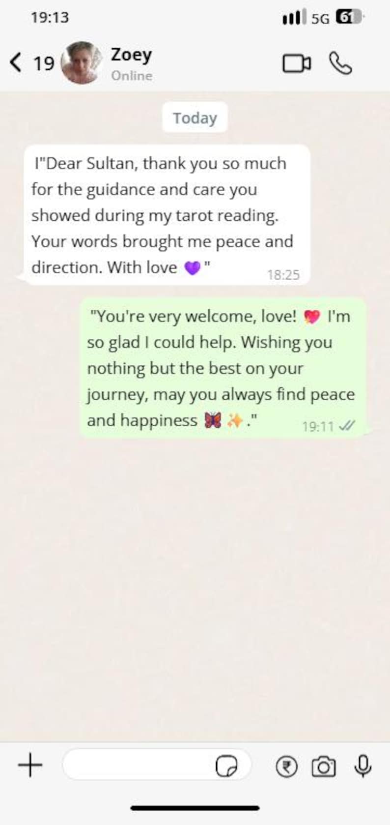 May include: Screenshot of a mobile phone screen displaying a chat conversation. The text includes messages about a tarot reading, with the sender named Zoey. The conversation includes the time stamps and emojis.