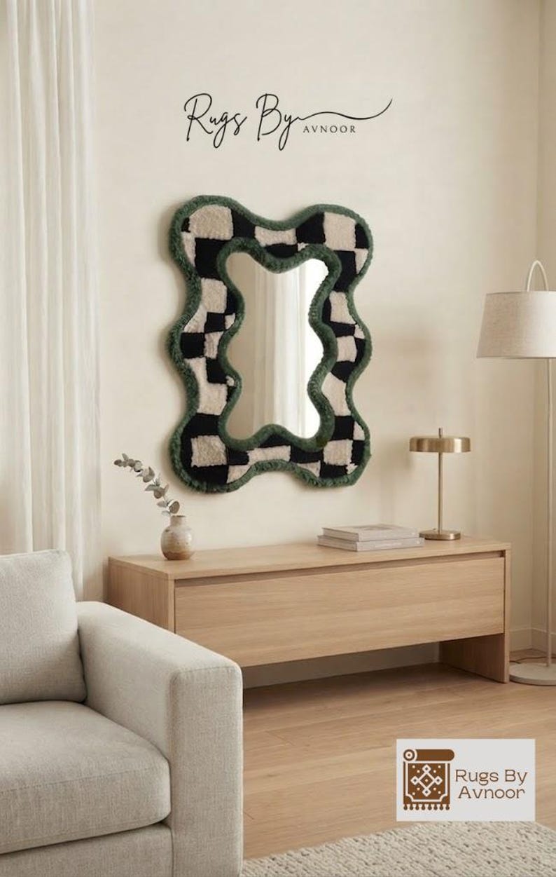 Organic checkerboard tufted wall mirror styled above a wooden console in a modern living room.