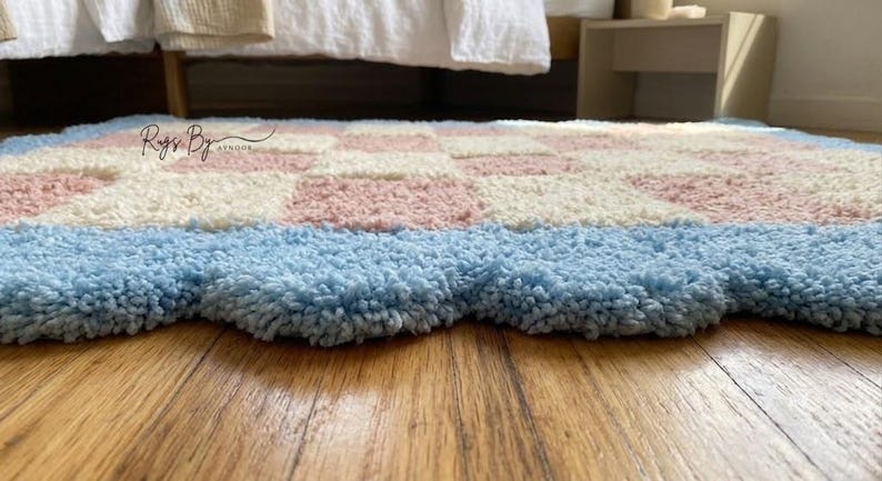 Low-angle view highlighting the thickness and pile height of the tufted rug.