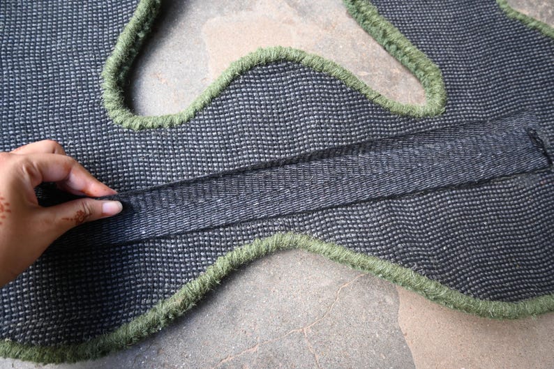 Backing of Green Checkerboard Hand Tufted Mirror showing securing straps