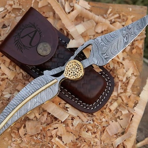 Handmade Damascus Steel Folding Knife: Leaf Design, Leather Sheath