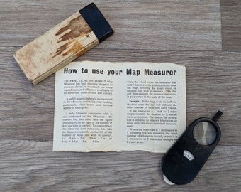 Curvímetro/opisômetro vintage 1959 'Practical Motorist Map Measurer' com caixa original