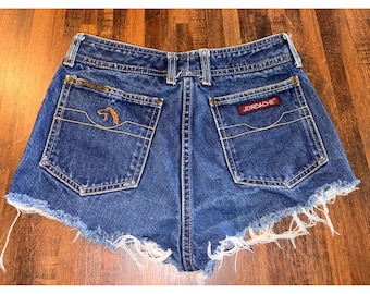 Vintage Jordache denim shorts met hoge taille en afgesneden pijpen, blauw, gerafelde zoom, dames
