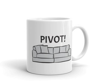May include: White ceramic coffee mug with a black outline of a couch and the text "PIVOT!" printed on it.