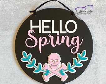 Hello Spring Skull and Crossbones Round Sign, wood sign, floral, punk rock, layered wood, goth decor, hand painted, spring, pastels