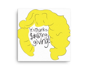 May include: Square canvas art with a white background. The artwork features a yellow, cartoon-style hairstyle with the text "It's Thanks-$#!@!ing-giving!" written in black. The canvas is stretched and ready to hang.