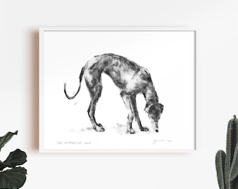 May include: A black and white charcoal drawing of a dog sniffing the ground. The drawing is on white paper and is framed in a white frame. The text "The Interesting One" is written below the drawing.