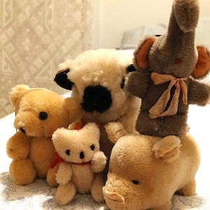 Little menagerie of wool vintage toys