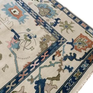 Hand-Knotted Wool Oushak Rug: Muted Ivory, Blue & Green Floral 8x10
