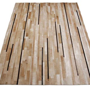 Alfombra de área de patchwork de piel de cuero con diseño de tiras, hecha a mano, para la decoración del hogar en la sala de estar.