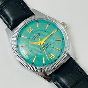 Vintage Oris Hand-Winding Watch: Green Dial, 17 Jewels, Swiss Made