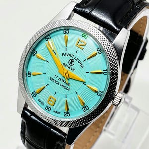 Relógio Favre Leuba Geneve vintage restaurado, mostrador verde-mar, mecânico de corda manual, suíço, usado.