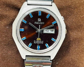 Vintage RICOH Automatic-klocka: Brun urtavla, dag/datum 21 juveler, rostfritt stål japanskt