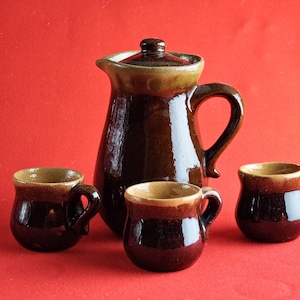 Vintage Clay Drinking Set. Decanter and Three Cups.