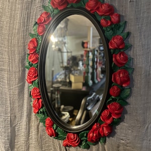 Wall hanging rose mirror