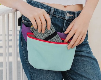 Riñonera repelente a líquidos con tejido resistente y ligero - Riñonera ajustable con bolsillos para viaje, festivales