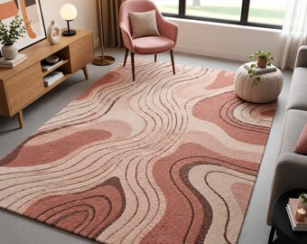May include: A rectangular area rug featuring a textured, wavy pattern in shades of terracotta, dusty rose, cream, and dark brown. The design consists of flowing, organic lines and layered shapes that create a sense of movement across the surface.
