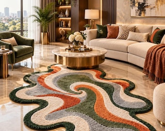 May include: An area rug with an irregular, organic shape featuring a wavy, swirling pattern. The rug is composed of textured, tufted sections in alternating colors of deep forest green, burnt orange, light gray, and cream white.