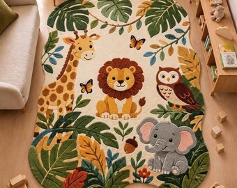 May include: An area rug with an irregular shape featuring a cream background and a jungle theme. The design includes a yellow giraffe, a brown lion, a brown owl, and a gray elephant surrounded by green tropical leaves, butterflies, and an acorn.