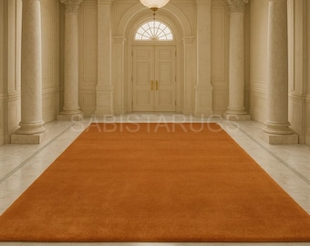 Verbrand oranje wollen vloerkleed, modern effen vloerkleed