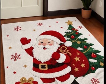 May include: A rectangular area rug featuring a white background with a central illustration of Santa Claus wearing a red suit and black boots, carrying a red sack. A green Christmas tree, a red gift box with a gold ribbon, and red snowflakes are present.