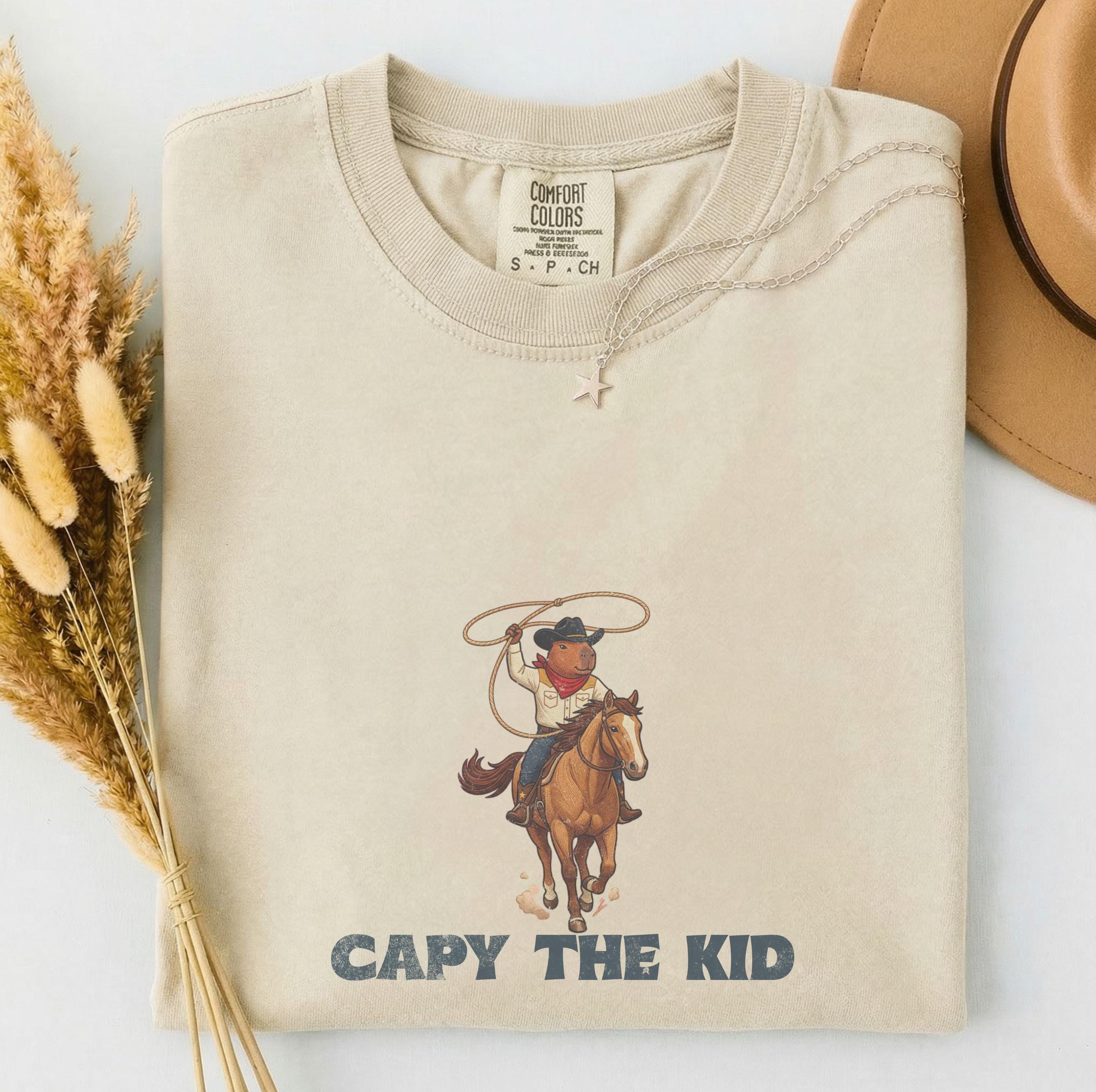 30 Cowboy Hat Crochet Patterns for Western-Inspired Hats, Miniatures, and Giftable Makes 3 Capybara with Cowboy Hat Shirt Design
