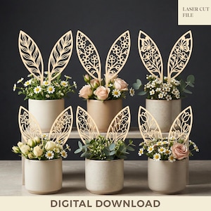May include: Six ceramic pots filled with flowers, each adorned with laser-cut wooden bunny ears. The ears feature intricate floral and leaf designs. The text "DIGITAL DOWNLOAD" is at the bottom, and "LASER CUT FILE" is at the top right.