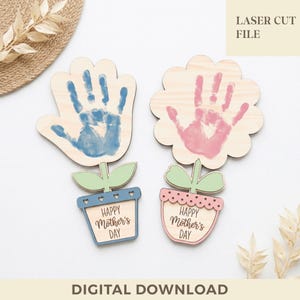May include: Two wooden flower-shaped crafts with handprint designs. One has a blue handprint, the other pink. Each has a flower pot base with "HAPPY MOTHER'S DAY" text. The image also includes the text "LASER CUT FILE" and "DIGITAL DOWNLOAD".