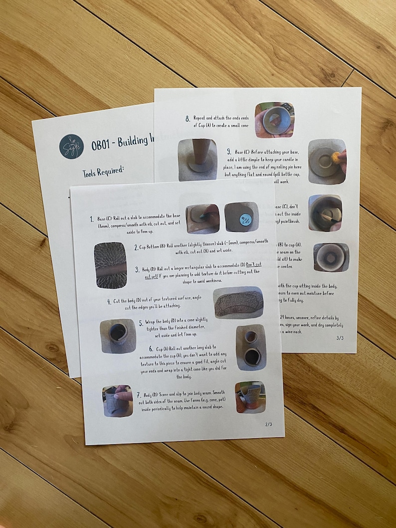 May include: Two sheets of paper with instructions for a pottery project, titled "OB01 - Building Instructions." The instructions include diagrams and text, with steps for creating a small cone and other pottery shapes. The papers are on a wooden surface.