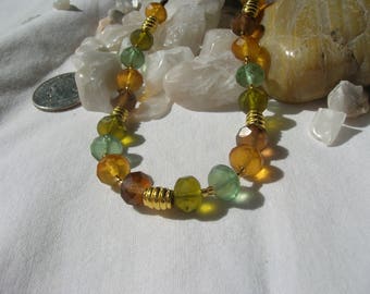Romantic necklace with green, yellow, blue, and amethyst frosted faceted Czech beads