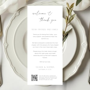 May include: A rectangular white wedding menu card featuring black text that reads Welcome & Thank you, Dear Friends and Family, followed by a message from Oliver & Sophia dated November 19 2025, and a QR code at the bottom for photo sharing.