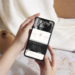 Mobile responsive wildflower wedding website template shown on smartphone, editable Canva wedding website design optimized for mobile and desktop viewing