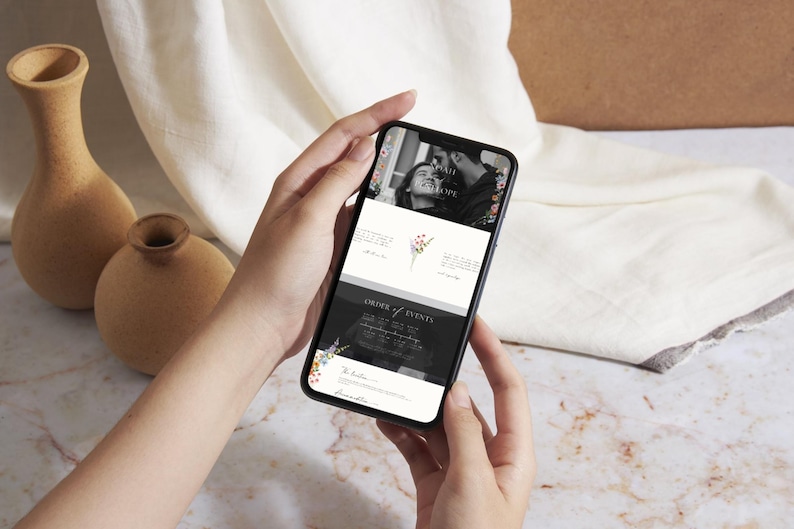 Mobile responsive wildflower wedding website template shown on smartphone, editable Canva wedding website design optimized for mobile and desktop viewing