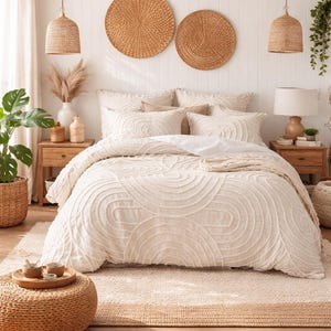 May include: A set of three ceramic mugs with a speckled, matte finish. The mugs are in shades of cream, light gray, and dark gray. Each mug has a simple, minimalist design, perfect for coffee or tea.