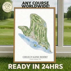 May include: A framed watercolor print of the Coeur d'Alene Resort golf course map, featuring green fairways, sand bunkers, and a blue lake. The text reads ANY COURSE WORLDWIDE!, Golfscape ATELIER, COEUR D'ALENE RESORT, Coeur d'Alene, ID, READY IN 24HRS.