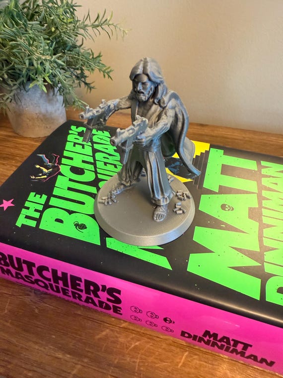 Uzi Jesus Figurine – Dungeon Crawler Carl Inspired