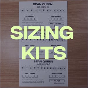 May include: Three white nail sizing kit cards with the text "BEAN QUEEN nail sizing kit" and the word "SIZING KITS" in large yellow letters. Each card has numbered nail samples and boxes for left and right hand sizes.