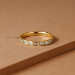 14k Yellow Gold Moissanite Wedding Band: Emerald Cut Bezel Set