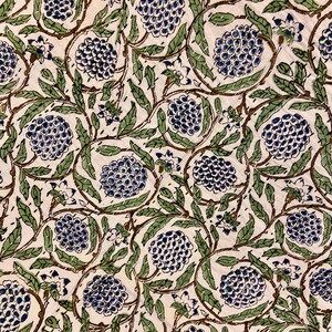 May include: Close-up of a fabric with a repeating floral pattern. The design features clusters of blue flowers, green leaves, and brown stems against an off-white background. The pattern is likely used for textiles or home decor.