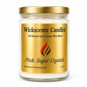 May include: A clear glass candle jar with a gold lid and a gold label. The label reads Wickscentz Candlez, All Natural Soy/Coconut Wax Blend, Pink Sugar Crystals, and Hand Poured in Rochester NY, with a flame graphic and wt. 9oz printed on it.