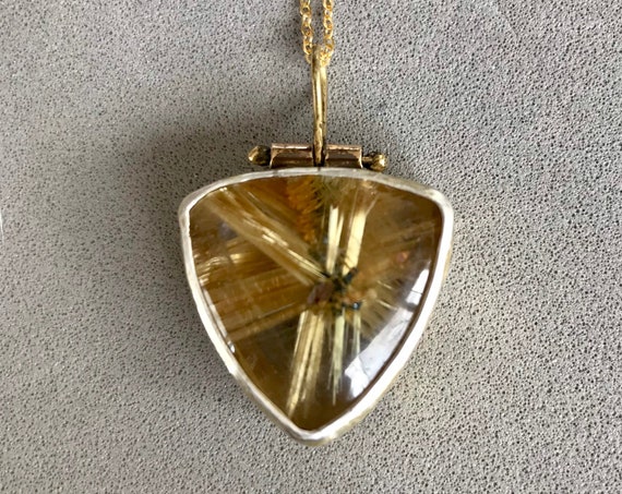 Rutilated Quartz with a textured bezel and 22k gold overlay pendant