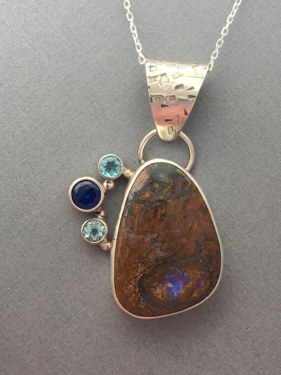 Boulder Opal with Blue Spinel and Apatite