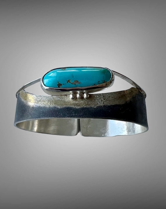 Turquoise cuff with gold and black