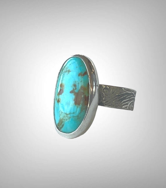 Turquoise ring with floral and leaf band