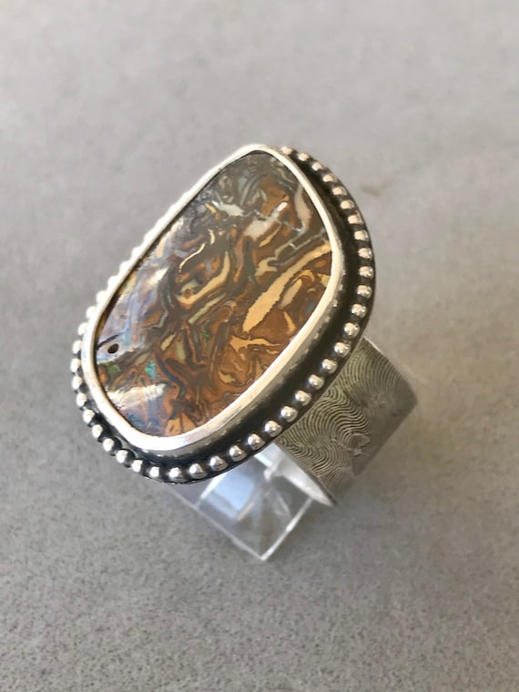 Very large matrix boulder opal ring