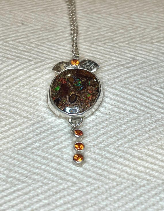 Orange sapphire with Australian boulder opal