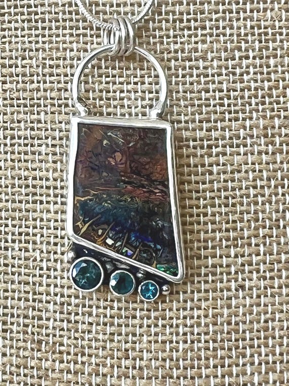 Australian Boulder Opal with London blue topaz pendant
