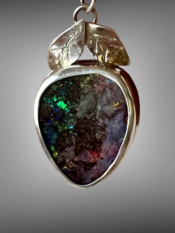 Boulder Opal topped with leaves pendant