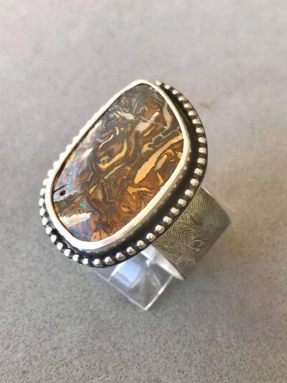 Very large Man’s matrix boulder opal ring